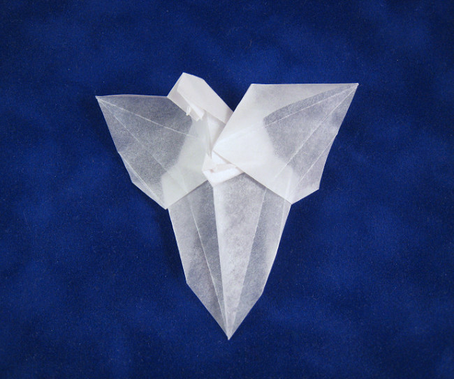 Origami Angel on the wall by Neal Elias folded by Gilad Aharoni