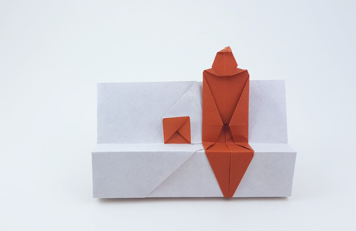 Origami Person sitting on a bench by Ashimura Shun'ichi folded by Gilad Aharoni