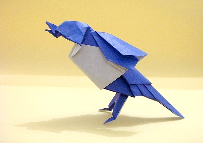 Wet-folded from a square of double-sided mulberry paper origami bird