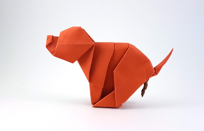 Origami Dog - pooping by Luis Fernandez Perez folded by Gilad Aharoni