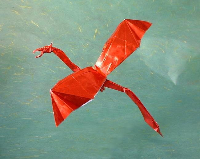 Origami Dragon in flight by Charles Esseltine folded by Gilad Aharoni