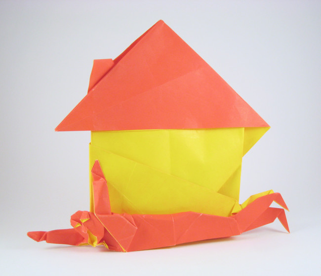 Origami Man under house - mortgage by Fernando Gilgado Gomez folded by Gilad Aharoni