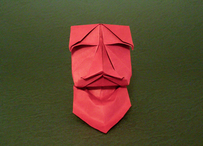 Origami Grinning old man mask by Kunihiko Kasahara folded by Gilad Aharoni
