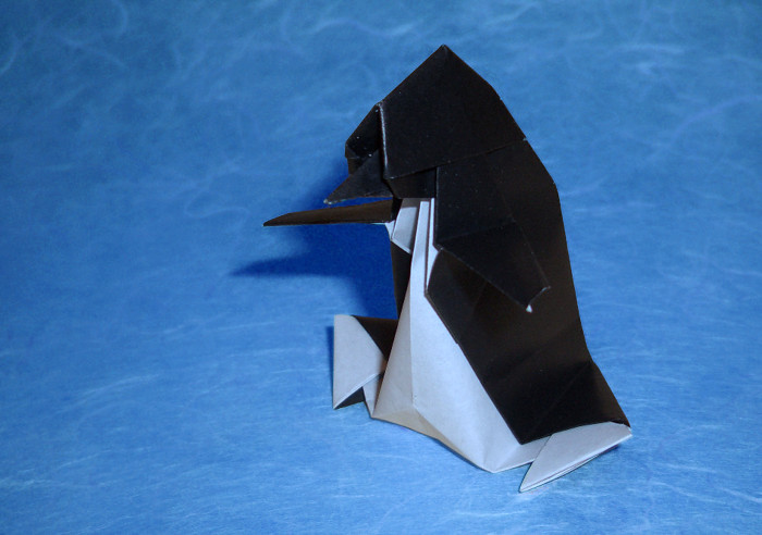 Origami Penguin - skating by Taichiro Hasegawa folded by Gilad Aharoni