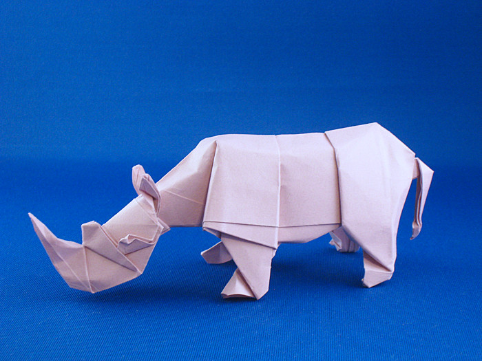 Origami Rhinoceros - white by Quentin Trollip folded by Gilad Aharoni
