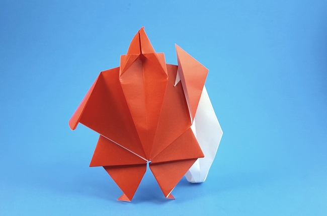Origami Santa with bag by Akira Yoshizawa folded by Gilad Aharoni