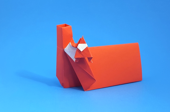 Origami Santa in chimney place card by Hans Birkeland folded by Gilad Aharoni