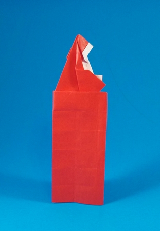 Origami Santa Claus in chimney by Robert Harbin folded by Gilad Aharoni