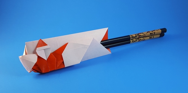 Origami Santa Claus chopsticks wrapper by Inayoshi Hidehisa folded by Gilad Aharoni