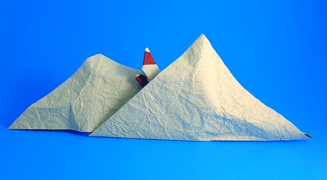Origami Santa Claus lost in the snowy mountains by Francesco Miglionico folded by Gilad Aharoni
