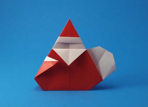 Origami Santa Claus with bag by Unemoto Yoshihiro folded by Gilad Aharoni