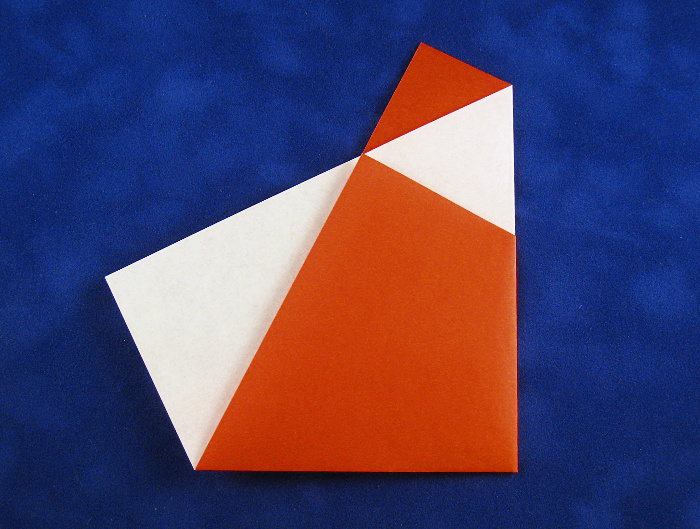 Origami Two-fold santa by Paula Versnick folded by Gilad Aharoni