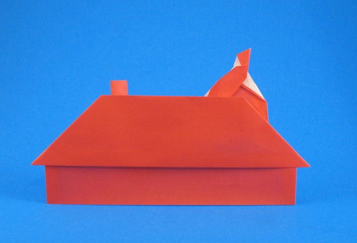 Origami Santa on his rounds by Iris Walker folded by Gilad Aharoni