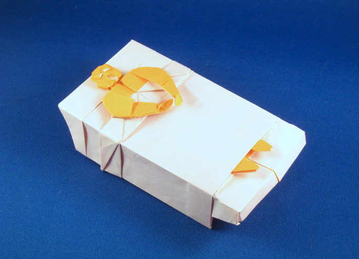 Origami Man in bed - sick by Fernando Gilgado Gomez folded by Gilad Aharoni