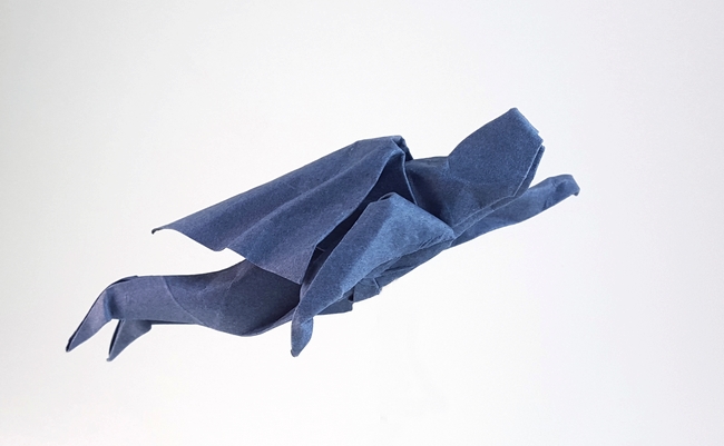 Origami Superman flying by John Montroll folded by Gilad Aharoni