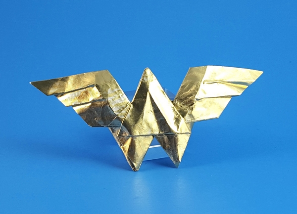Origami Wonder Woman symbol by John Montroll folded by Gilad Aharoni