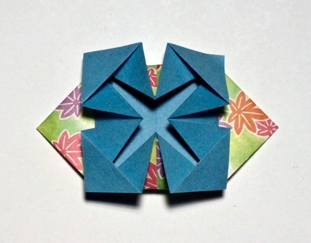Origami Paper fastening flower by Gay Merrill Gross on giladorigami.com