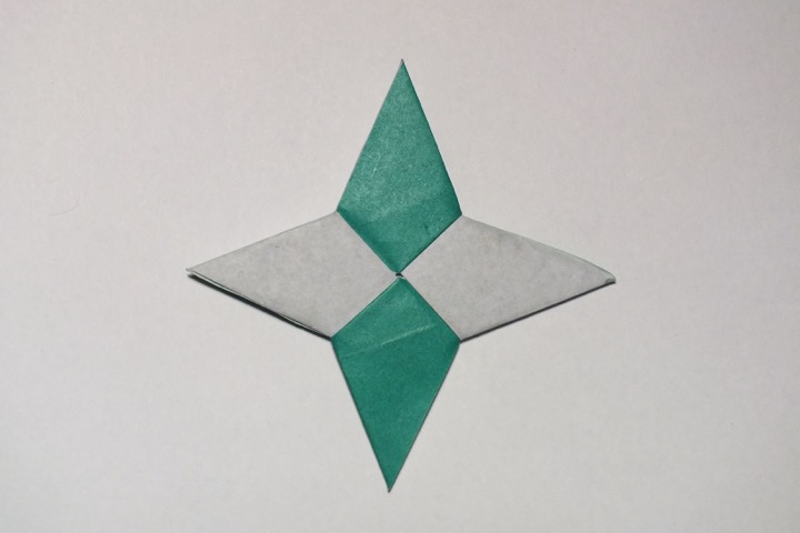 Origami Two-toned four-pointed star by John Montroll on giladorigami.com