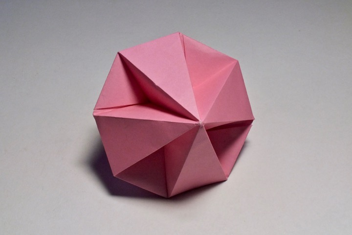 Origami Dimpled octagonal dipyramid in a sphere by John Montroll on giladorigami.com