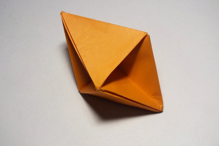 Origami Dimpled silver square dipyramid by John Montroll on giladorigami.com