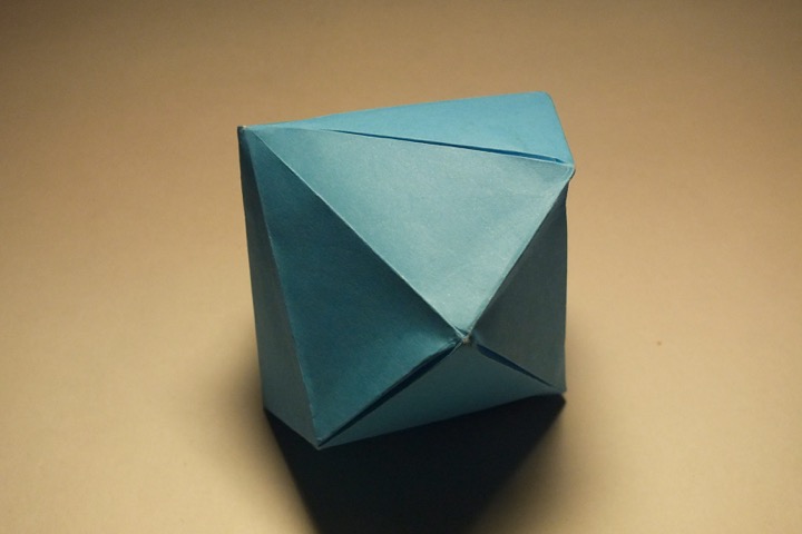 Origami Heptagonal dipyramid in a sphere by John Montroll on giladorigami.com