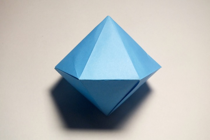 Origami Hexagonal dipyramid in a sphere by John Montroll on giladorigami.com