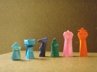 Origami Chess pieces by John Montroll on giladorigami.com