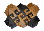 Origami Swirl coaster or mat by Toshikazu Kawasaki on giladorigami.com