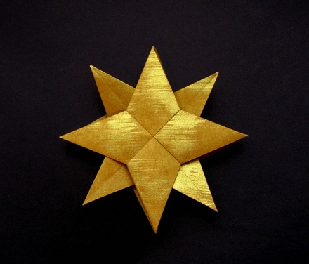 Origami Layered eight-pointed star by John Montroll on giladorigami.com