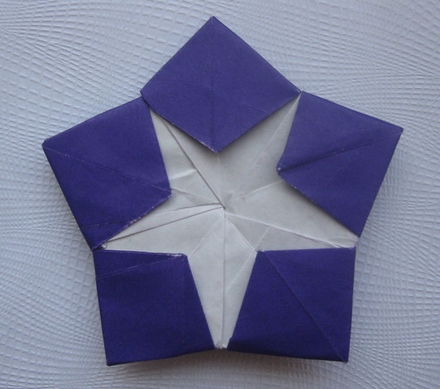 Origami Double five-pointed star by John Montroll on giladorigami.com