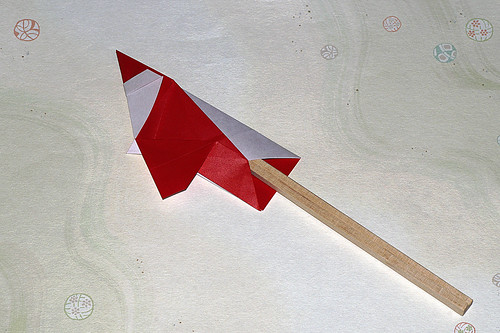 Origami Santa Claus chopstick wrapper by Yamada Katsuhisa on giladorigami.com