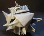 Origami Shell - sea snail by Toshikazu Kawasaki on giladorigami.com