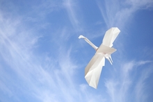 Origami Crane in flight by Choi Donggyu on giladorigami.com