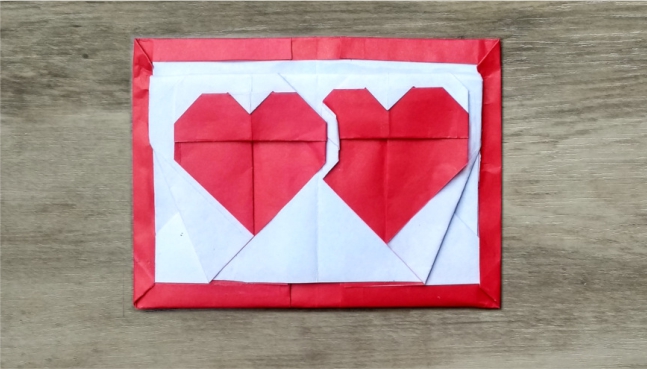 Origami 2 hearts in frame by Hadi Tahir on giladorigami.com
