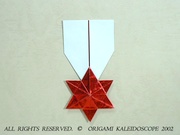 Origami Star medal by Francis Ow on giladorigami.com