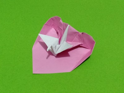 Origami Crane on heart by Kobayashi Toshihiko on giladorigami.com
