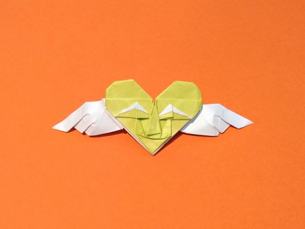 Origami Flying heart with face by Tomo Ogawa on giladorigami.com
