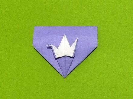 Origami Pentagonal envelope with crane by Fujimoto Yuko on giladorigami.com
