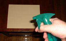 spraying the paper
