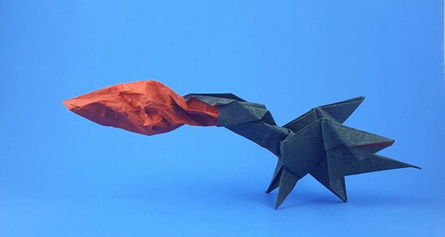 Origami Flaming dragon by Oriol Esteve. Folded from a square of Duo Thai paper by Gilad Aharoni on giladorigami.com