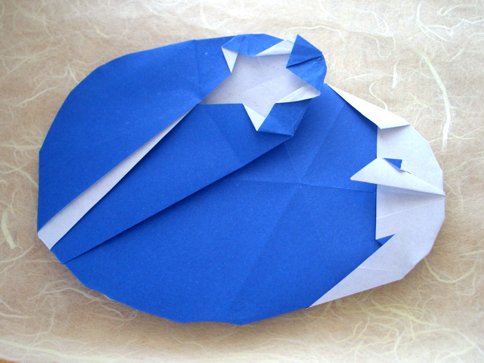 Origami Man in the moon watching a shooting star by Jeremy Shafer. Folded by Gilad Aharoni on giladorigami.com