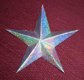 Origami Star by Nick Robinson. Folded from 5 squares of holographic paper by Gilad Aharoni on giladorigami.com